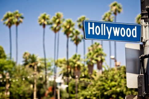 Hollywood boulevard sign, with palm trees in the background